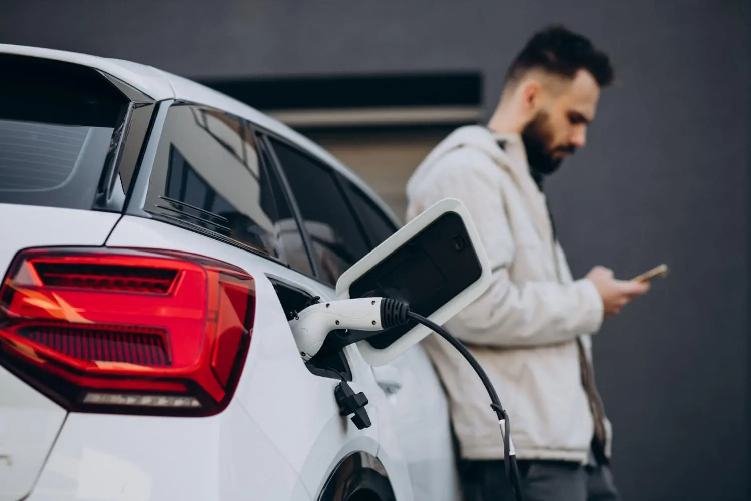 Electric vehicle charging reflects shifting rules for EV tax credit eligibility.